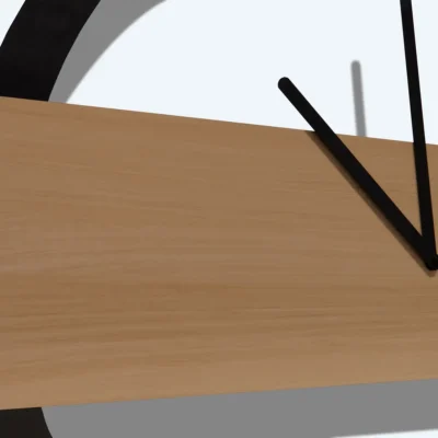 Closeup of minimalist wall clock design against white wall