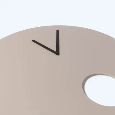 Close up of wall clock design with round cut out in beige colour